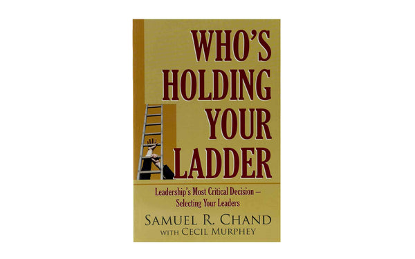 WHO'S HOLDING YOUR LADDER